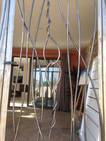 Fabrication sur mesure porte grille vitrée. Modèle Carla